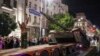 Russia - Members of the Wagner Group military company load their tank onto a truck on a street in Rostov-on-Don, Russia, Saturday, June 24, 2023, prior to leaving an area at the headquarters of the Southern Military District.